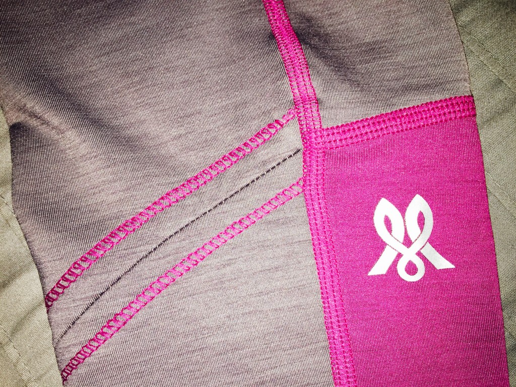 Stitching detail on right sleeve - with a reflective Manifest logo.